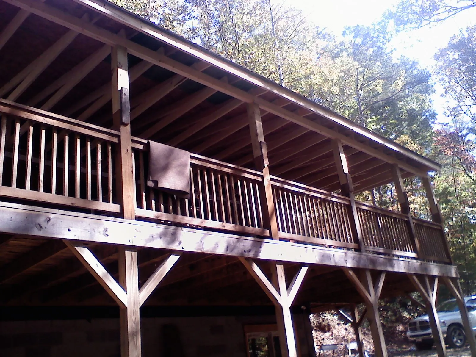 Timber framing under a new elevated porch and deck — Roof Leak Repair in New Stanton by Roofing Brothers
